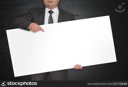 Empty poster is held by businessman.. Empty poster is held by businessman