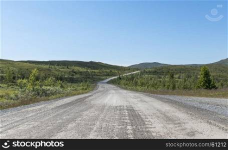 empty road in norway starting in Ulnes with the mountians and nature as background