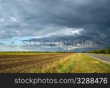 empty road near field. Landscape