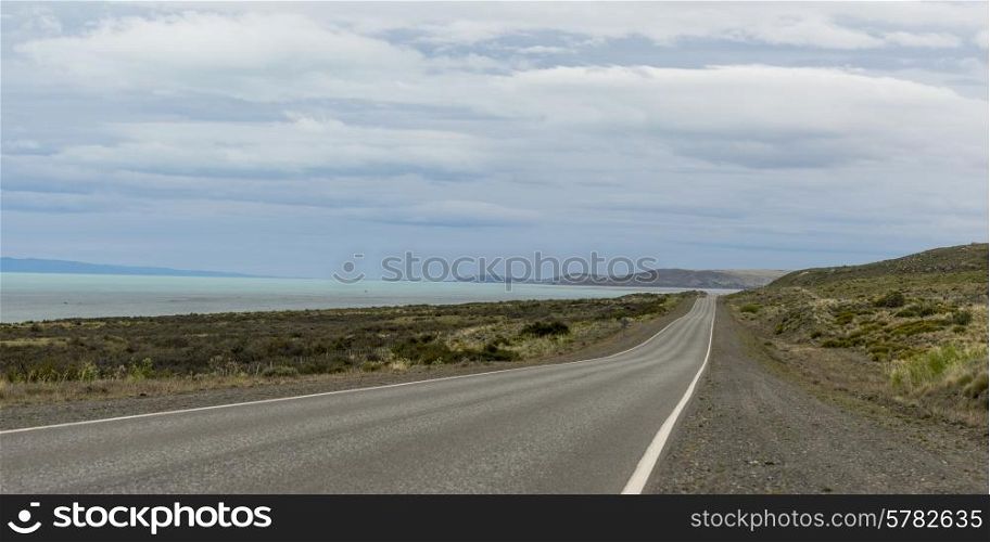 Empty road passing through coast, Santa Cruz Province, Patagonia, Argentina