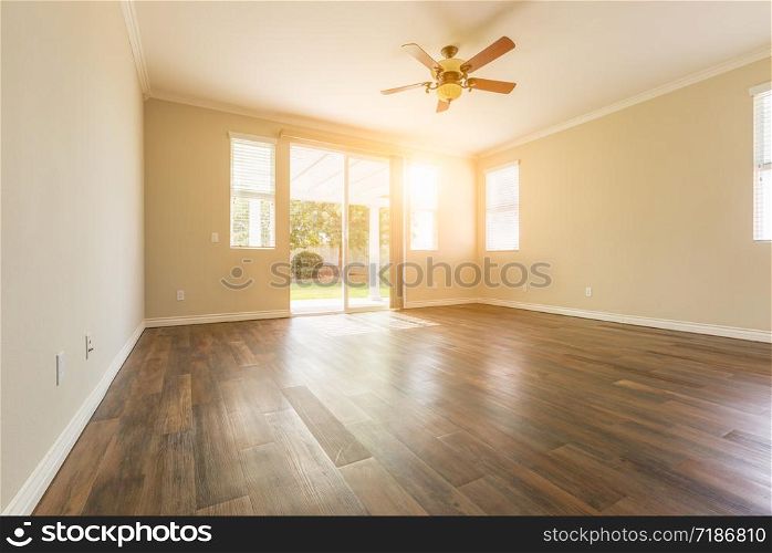 Empty Room of New House With Hard Wood Floors.