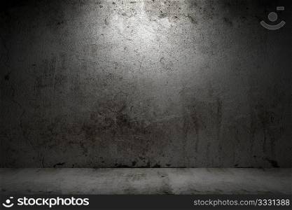empty room with grunge concrete wall and cement floor