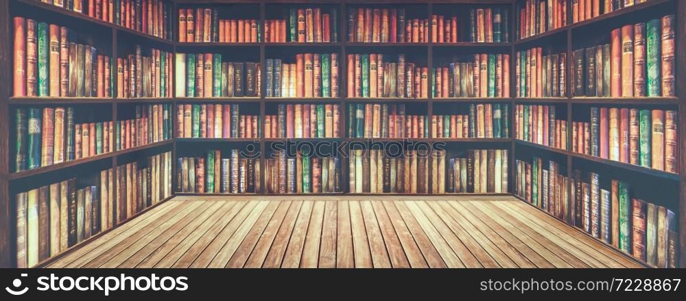 Empty room with wall and wooden floor with blurred bookshelf Many old books in a book shop or library