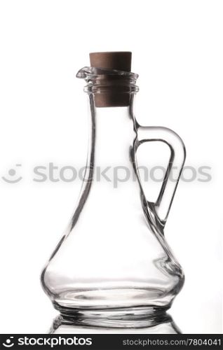 Empty salad dressing bottle on white background