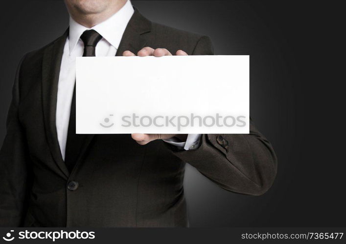 Empty sign is held by businessman.. Empty sign is held by businessman