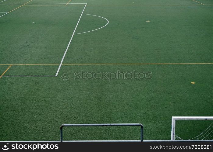empty soccer field, green grass in the stadium
