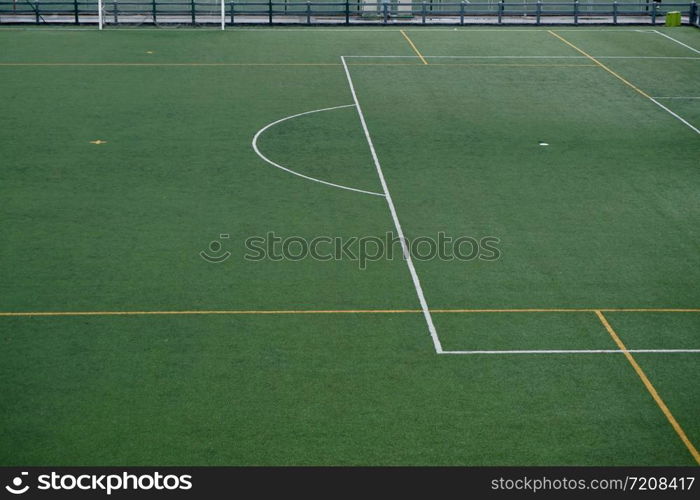 empty soccer field, green grass in the stadium