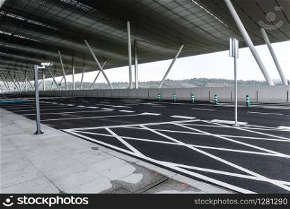 Empty space parking lot outdoor on modern building structure