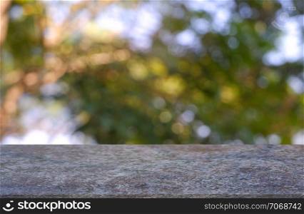 Empty table in front of abstract blurred green of garden and nature light background. For montage product display or design key visual layout - Image