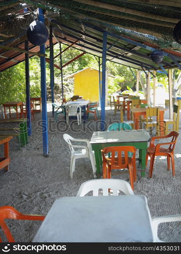 Empty tables and chairs in a restaurant, Providencia, Providencia y Santa Catalina, San Andres y Providencia Department, Colombia