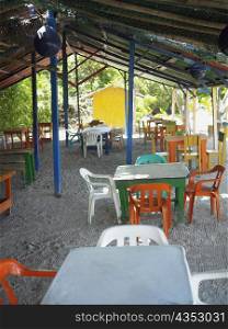 Empty tables and chairs in a restaurant, Providencia, Providencia y Santa Catalina, San Andres y Providencia Department, Colombia