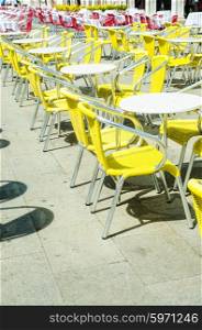 Empty tables of street cafe