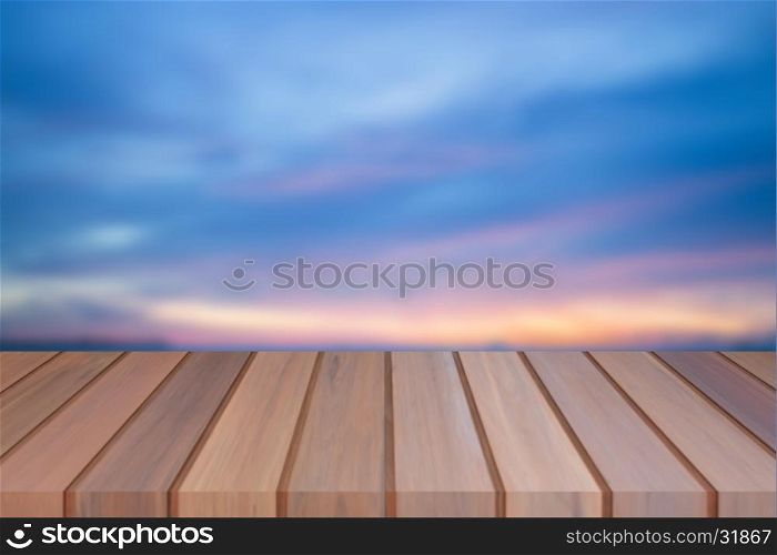 Empty top of wooden table with sunset background. For product display