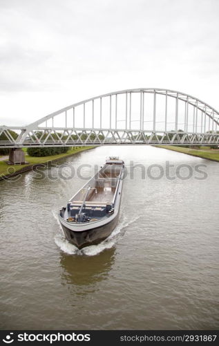 empty transport ship in canal in holland