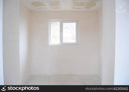 Empty unfinished room in a new constructed building