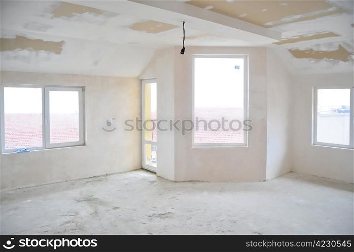 Empty unfinished room in a new constructed building
