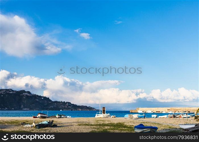 empty urban beach in Giardini Naxos resort in spring, Sicily