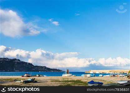 empty urban beach in Giardini Naxos resort in spring, Sicily