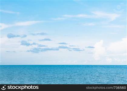 Empty vast blue tropical ocean seascape horizon and clear sky slightly clouds on summer day - Nature background wallpaper