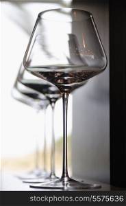 Empty very elegant wine glasses decorated on table