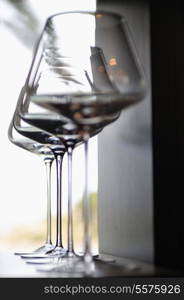 Empty very elegant wine glasses decorated on table