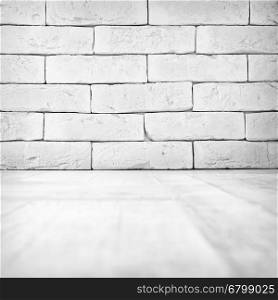 Empty vintage room. Vintage interior of white brick wall and old wooden floor