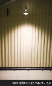 empty warehouse with a headlight on ceiling