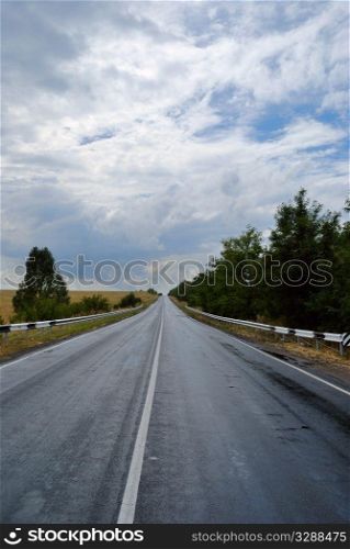 empty wet asphalt road. Landscape