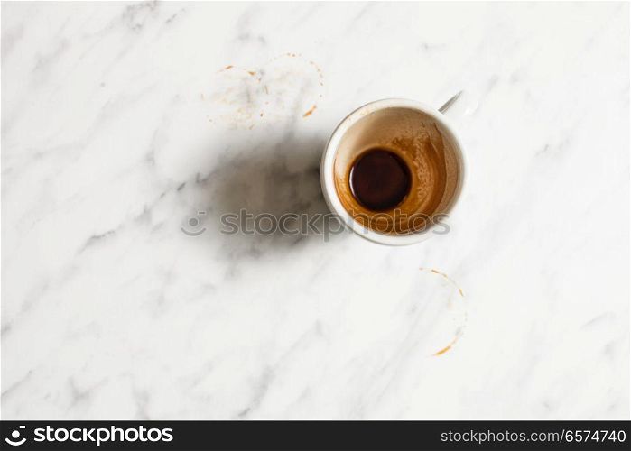 Empty white cup after espresso coffee. Empty white cup after espresso coffee - top view