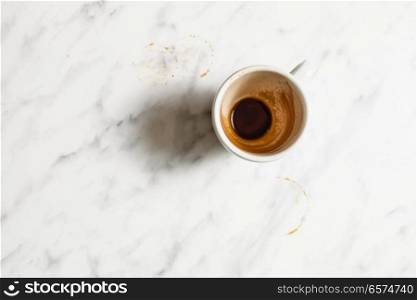 Empty white cup after espresso coffee. Empty white cup after espresso coffee - top view
