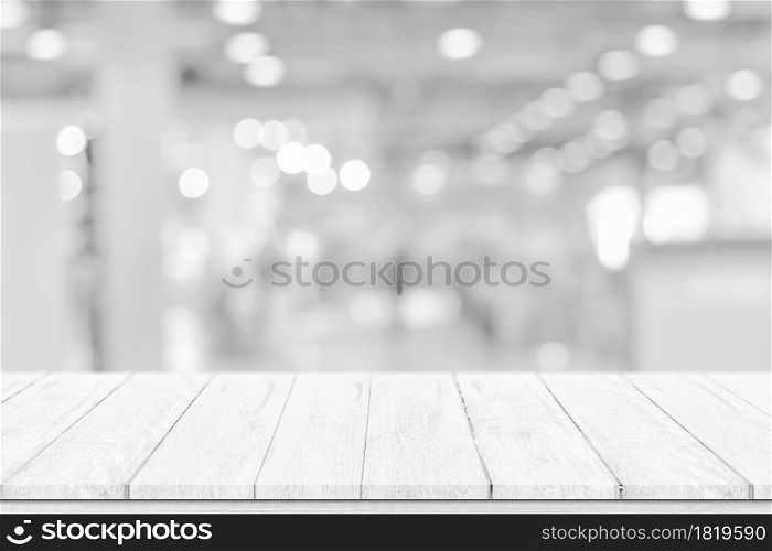Empty white table top, counter over blur white bokeh light background. wooden shelf for product display, banner or mockup.