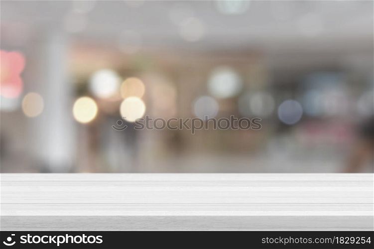 Empty white wood tabletop, desk over blur soft light in restaurant bokeh background, Wood table for product display banner, mock up, Template. Business presentation.