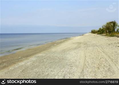 Empty wild sea shore. Kinburn Spit, near Ochakiv, Ukraine