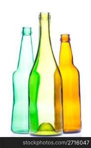 Empty wine and beer bottles on white background