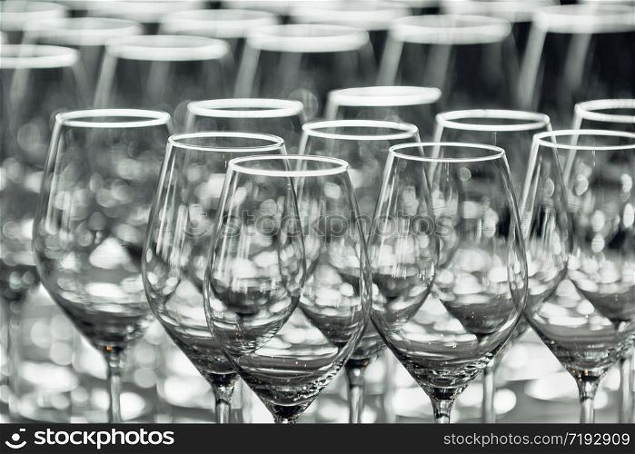 Empty wine glass on table in restaurant