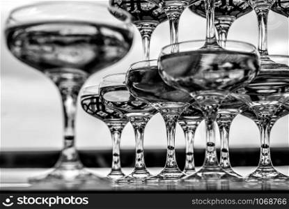 Empty wine or champagne glasses in black and white