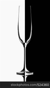 Empty wineglass on a white black background
