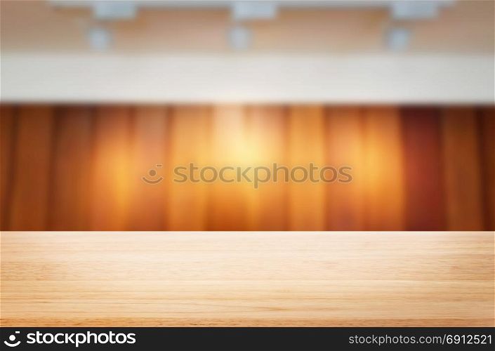 Empty wood table and blurred booked cafe light background. product display template. Business presentation.