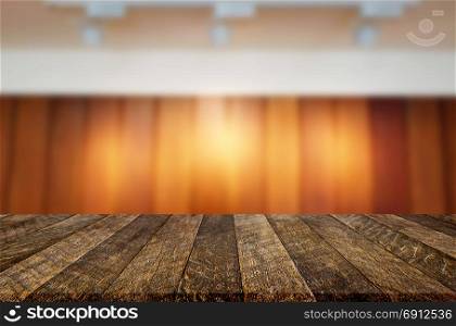 Empty wood table and blurred booked cafe light background. product display template. Business presentation.