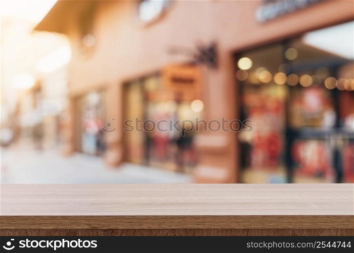 Empty wood table and Vintage tone blurred defocused of crowd people in walking street festival and shopping mall.