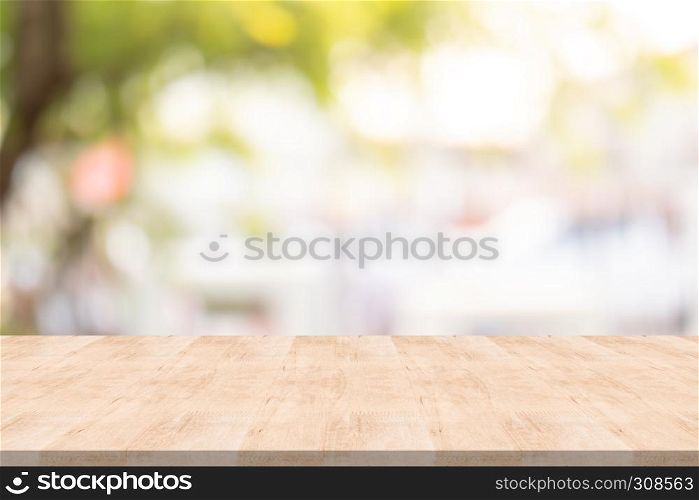 Empty wood table on blurred background copy space for montage