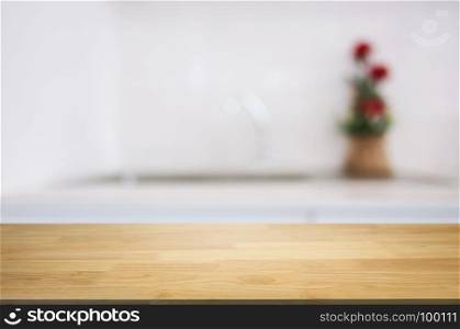 empty wood table over blurred kitchen background