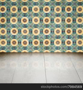 Empty wood table top and blur vintage ceramic tile pattern wall in background, Mock up template for display of your product.