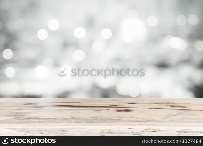 Empty wood table top for show product with blurred light bokeh b. Empty wood table top for show product with blurred light bokeh background. Picture for add text message. Backdrop for design art work.