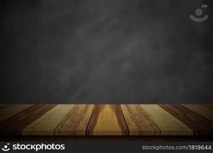 Empty wood table top over blur blackboard background.