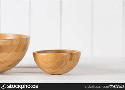 Empty wooden bowl on a vintage kitchen