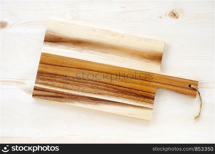Empty wooden chopping board on table, food display montage background
