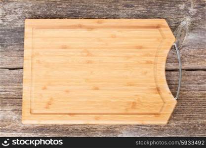 empty wooden cutting board on table background. cutting board