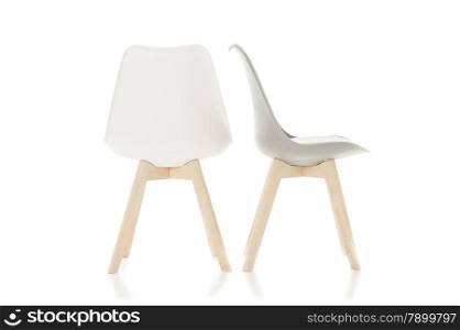 Empty Wooden Leg Chairs Isolated on White. Conceptual Empty White Wooden Leg Chairs Isolated on White Background.
