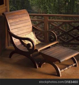 Empty wooden lounge chair